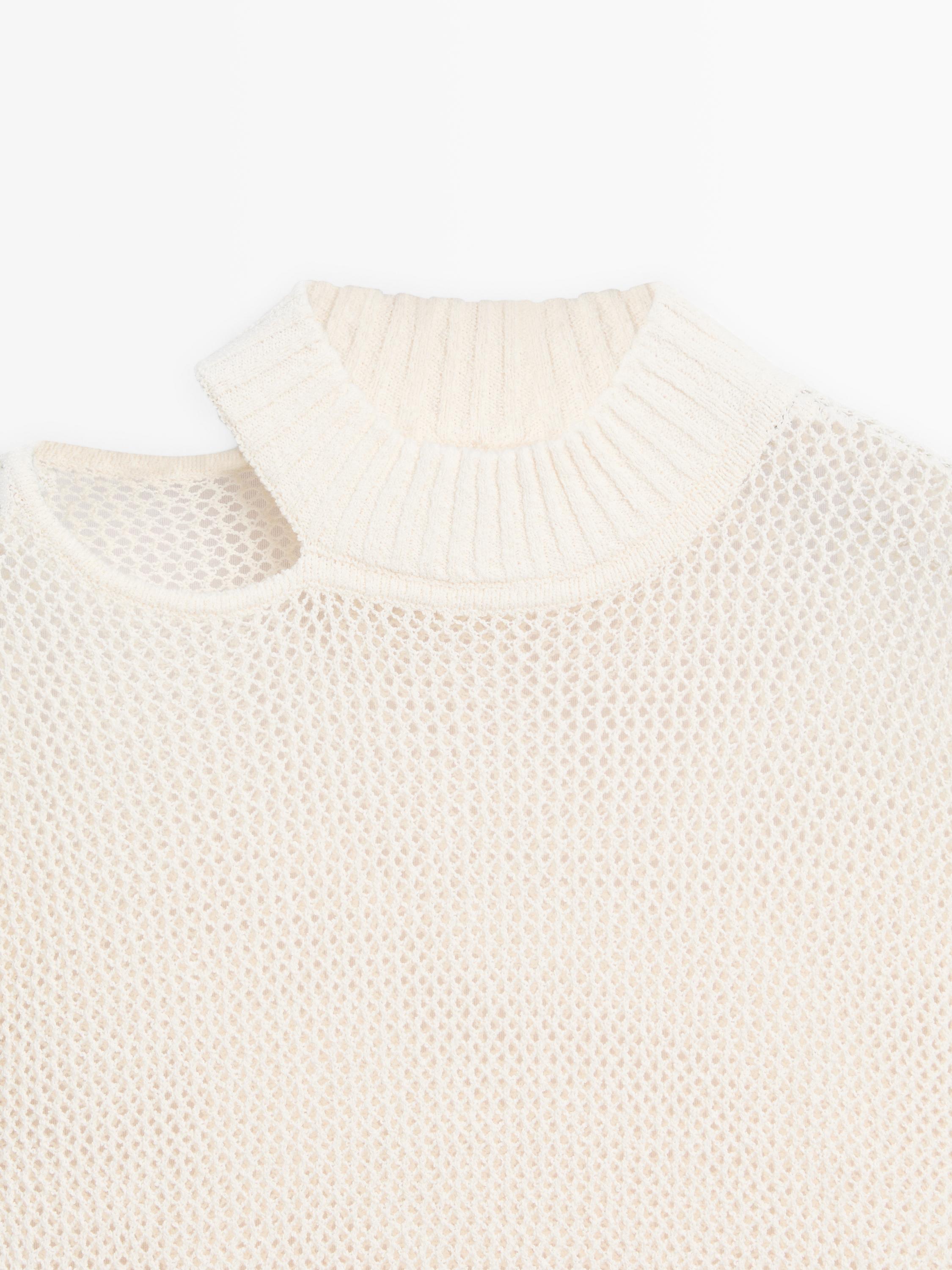 Knit top with cut-out neck